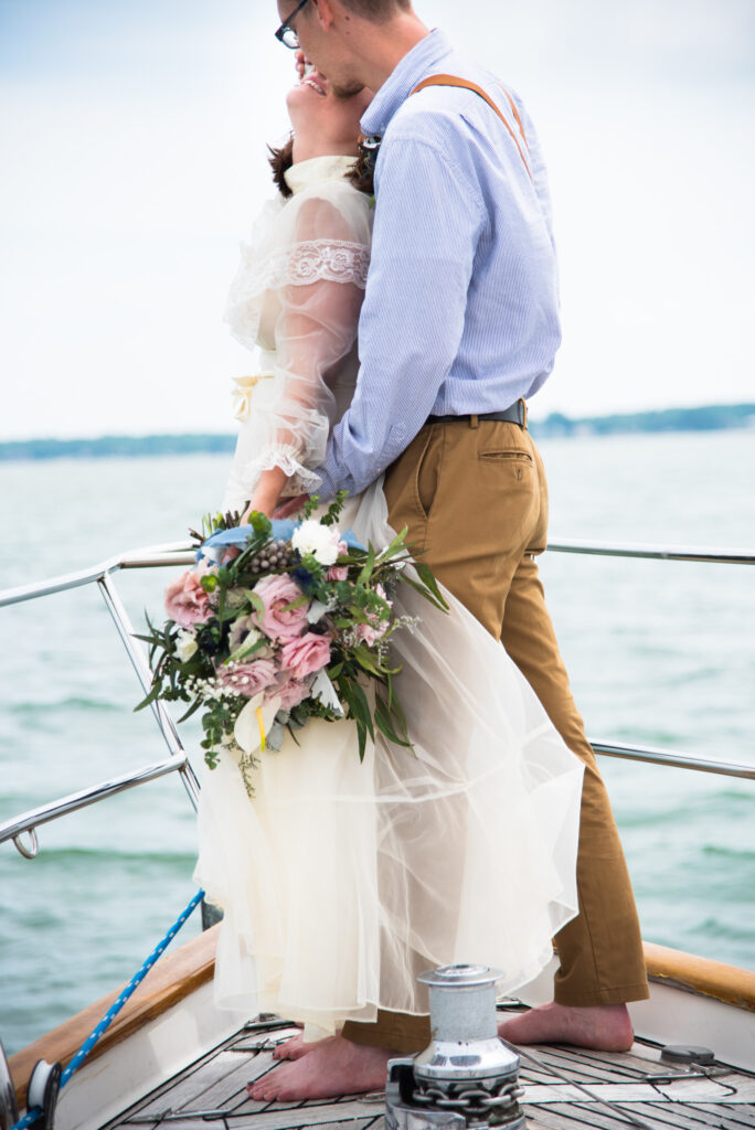 bride and groom on boat