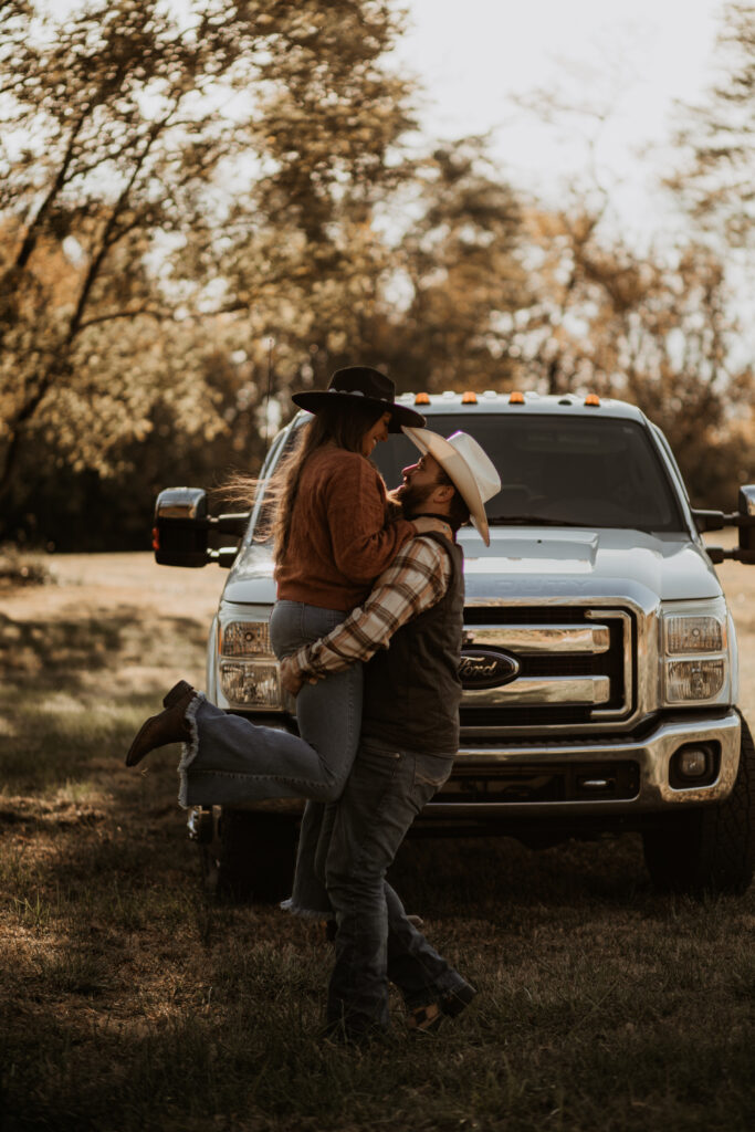 couple in front of truck